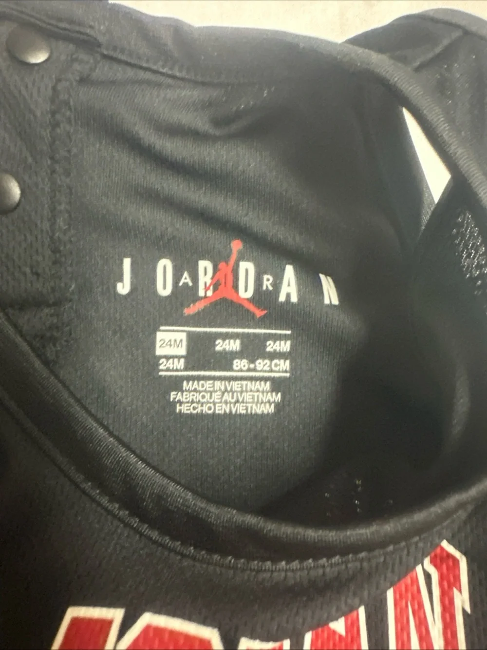 Jordan Black Infant Romper with Bold Front Branding